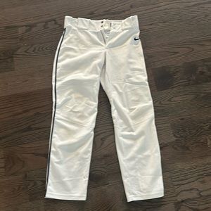 Youth XL, Nike baseball pants with navy blue stripes